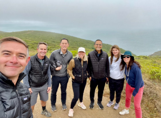McLure with his prior team at Salesforce out for a hike!