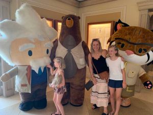 kids with giant stuffed animals